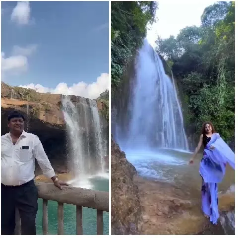 Man and Woman by Waterfall