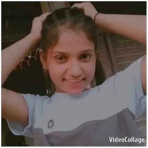 Young Girl Smiling Outdoors