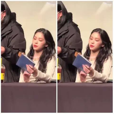 Person with Book at Indoor Event