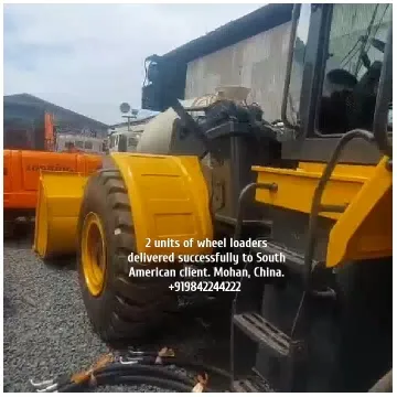 Yellow Wheel Loaders in Industrial Area