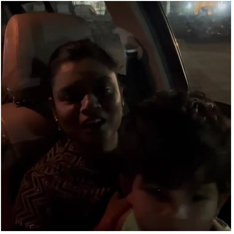 Nighttime Car Photo of Mother and Child