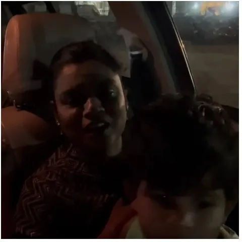 Nighttime Car Photo of Mother and Child