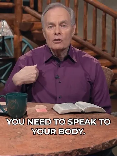 Older Man Speaking at Table