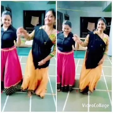 Two People Dancing in Traditional Attire