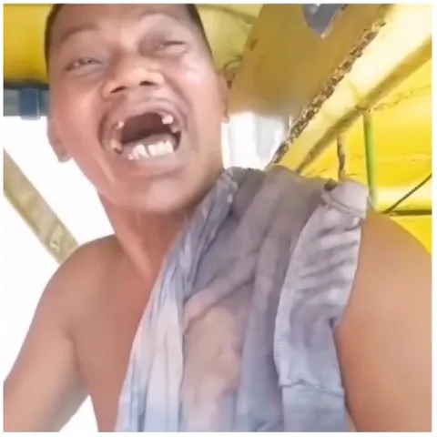 Expressive Face in Yellow Vehicle