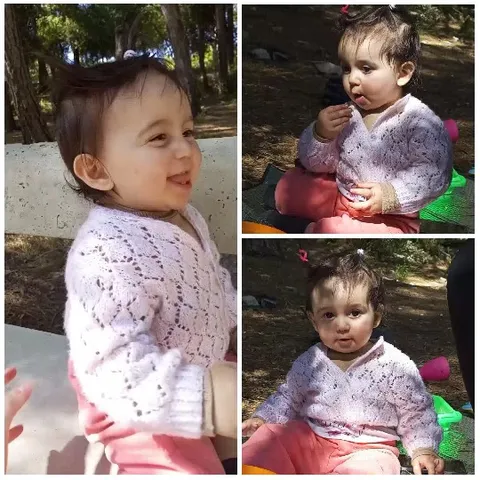 Child in Sweater at Park