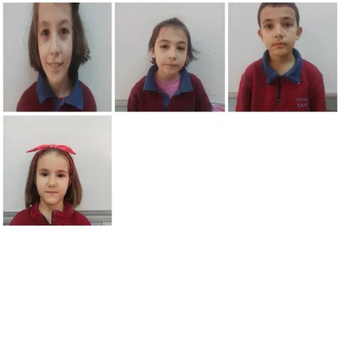 Four Children in School Uniforms