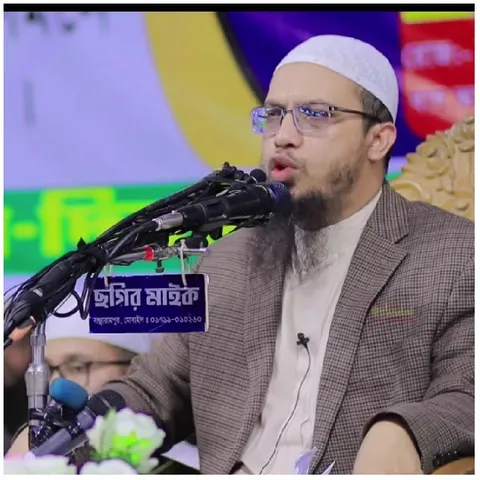 Man Speaking into a Microphone