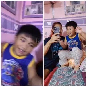 Child and Adult Smiling Together