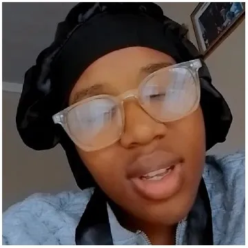 Close-Up of Person in Glasses
