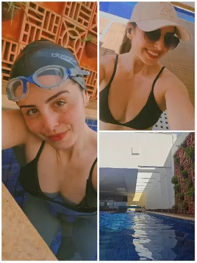 Woman Smiling in Swimming Pool