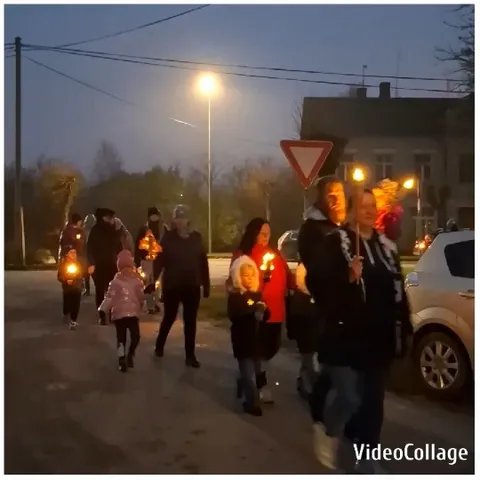 Group Holding Lanterns at Dusk