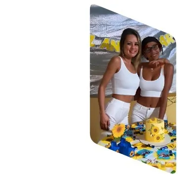 Smiling Duo at Decorated Table