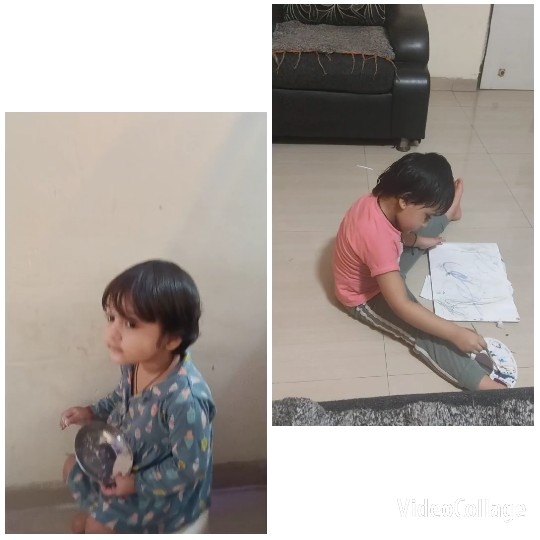 Child Holding Bowl and Painting