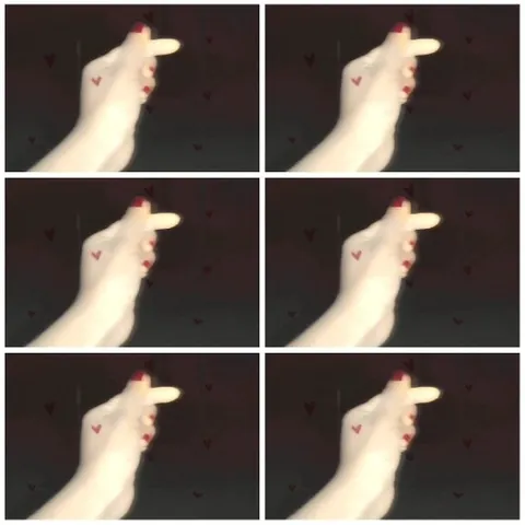 Pointing Hand with Red Nails