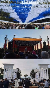Crowd Under Blue Canopy