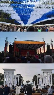 Crowd Under Blue Canopy