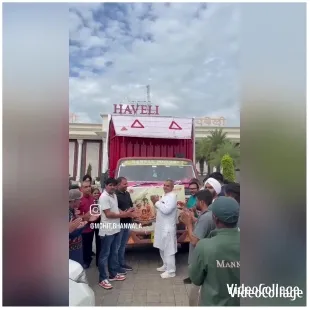 Gathering Around a Decorated Truck