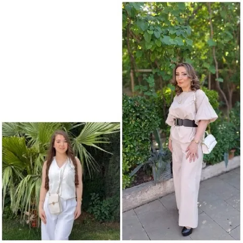 Two Women Posing in Garden