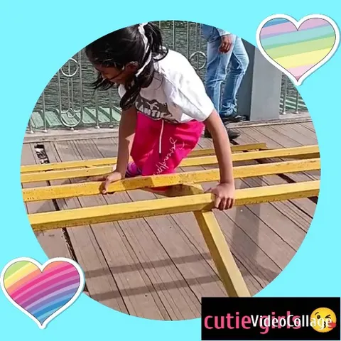 Child Climbing on Yellow Bars