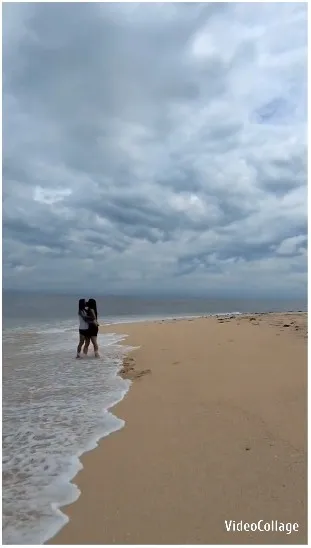 Couple on Cloudy Beach