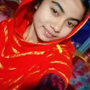 Smiling Person in Colorful Headscarf
