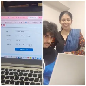 Laptop Screen with Two Smiling People