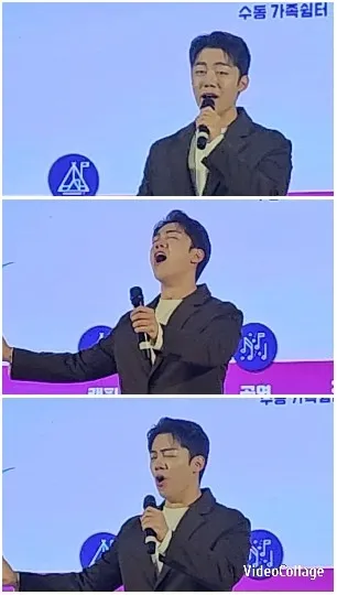 Suit-Clad Performer Singing on Stage