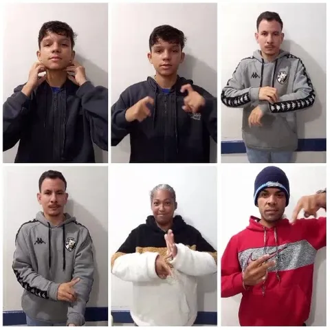 Diverse Group Making Hand Gestures