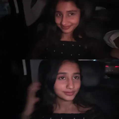Young Woman Smiling in Car