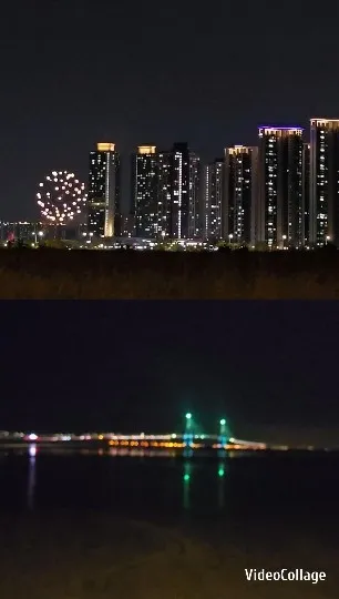 Nighttime Cityscape with Fireworks