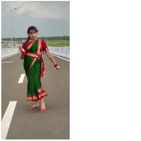 Woman Dancing in Sari