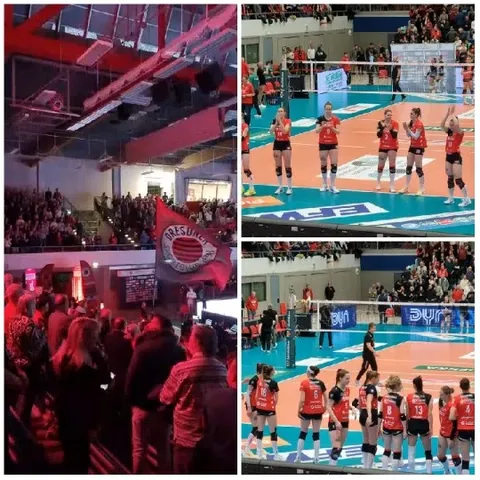 Volleyball Match Action and Spectators