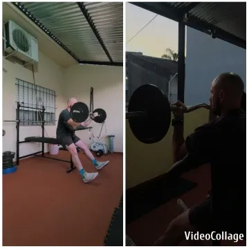Man Squats with Barbell in Gym
