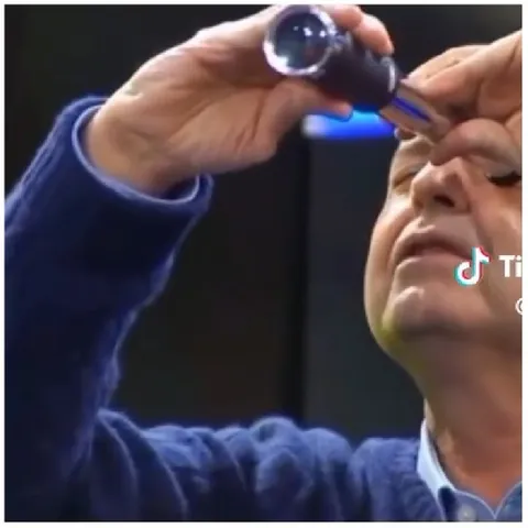 Applying Eye Drops with TikTok Branding