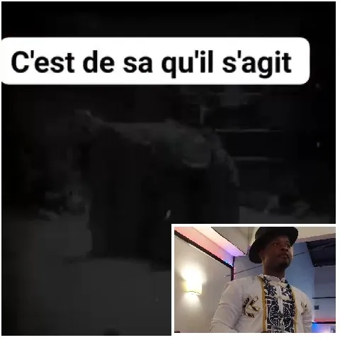 Man in Hat with French Text