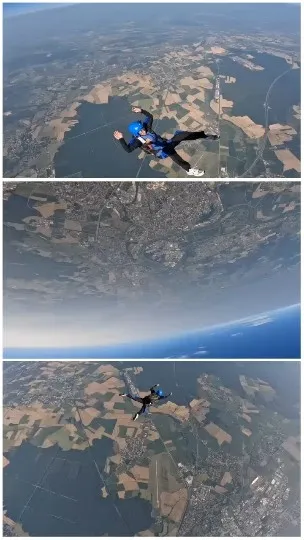 Skydiver Freefalling Over Landscape