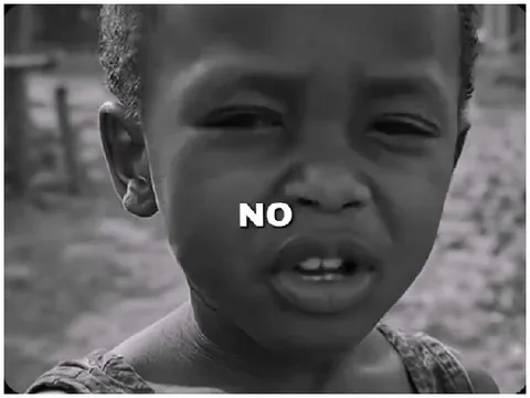 Serious Child with 'NO' Overlay