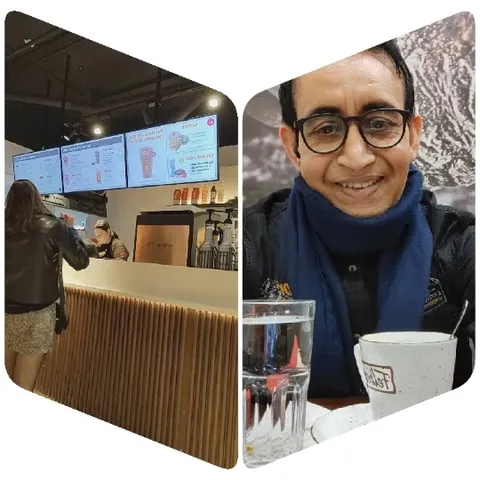 Cafe Interaction and Smiling Customer