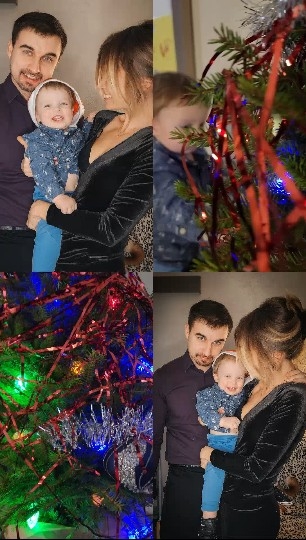 Family Smiling by Christmas Tree