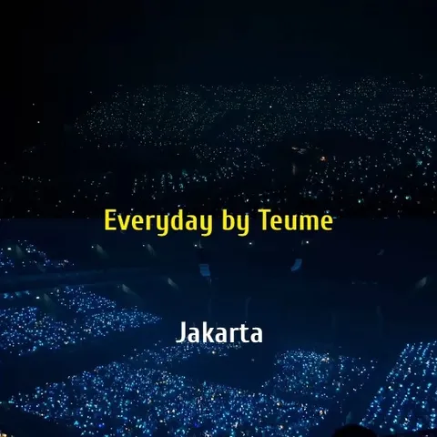 Audience with Light Sticks at Concert