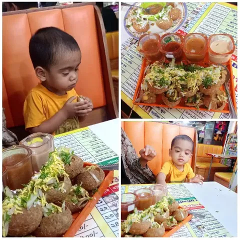 Child Enjoying Pani Puri at Restaurant