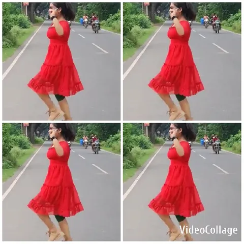 Woman in Red Dress Dancing Outdoors