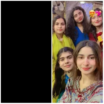 Women Posing in Colorful Traditional Clothing