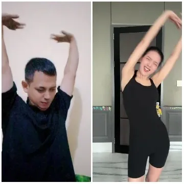 Two People with Arms Raised Indoors