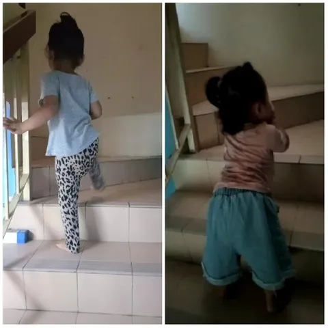 Child Climbing Stairs at Home