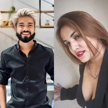 Smiling Man with Woman in Black