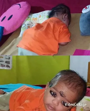 Baby Surrounded by Colorful Blankets
