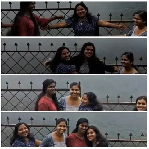 Women Posing by Metal Fence