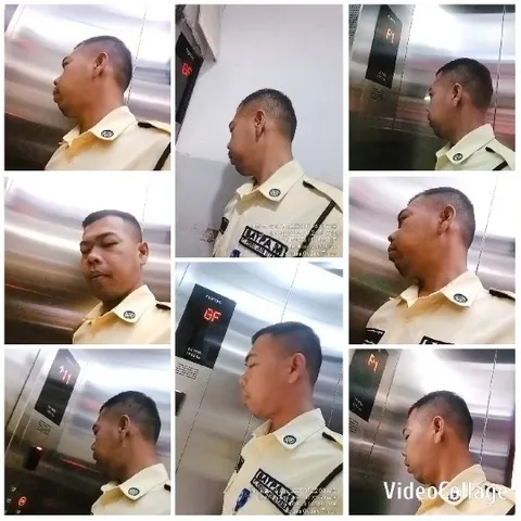Man Monitoring Elevator Interior